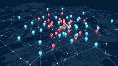 Map with multiple business location pins connected by network lines, showing centralized multi-location local SEO management