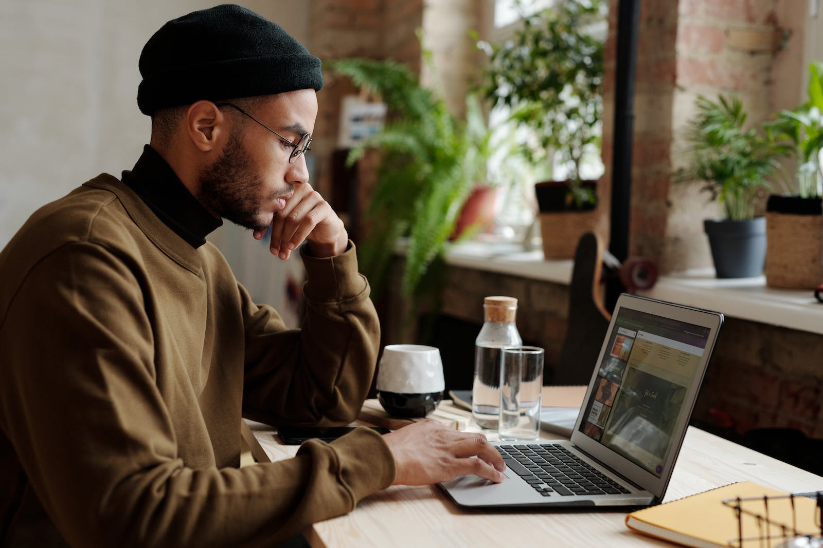 Man sitting in front of a computer