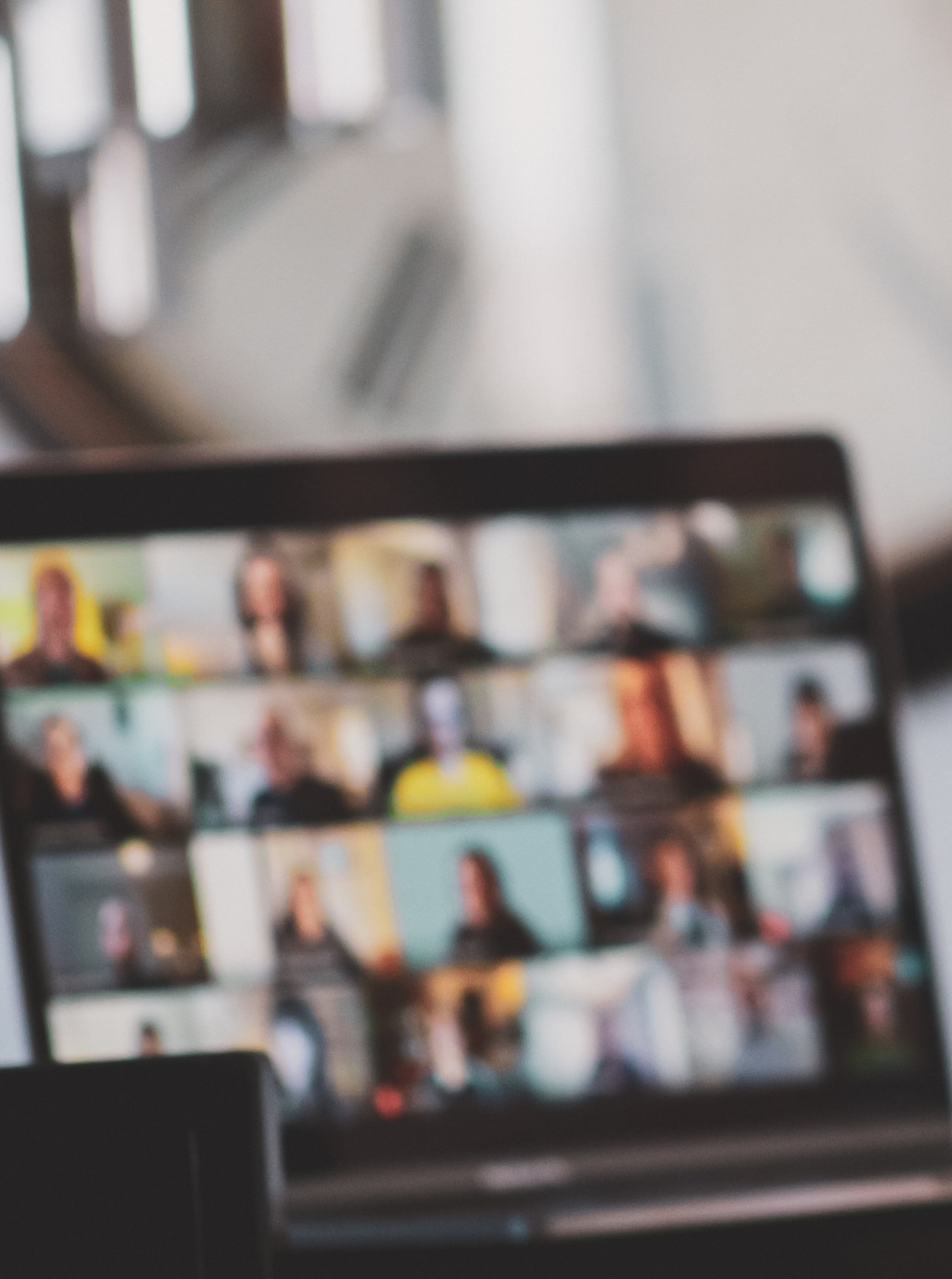 Laptop with an online meeting on the screen